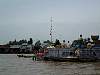 8-18 069 Floating markets at Co Tho - the poles on the boats advertise the produce.jpg